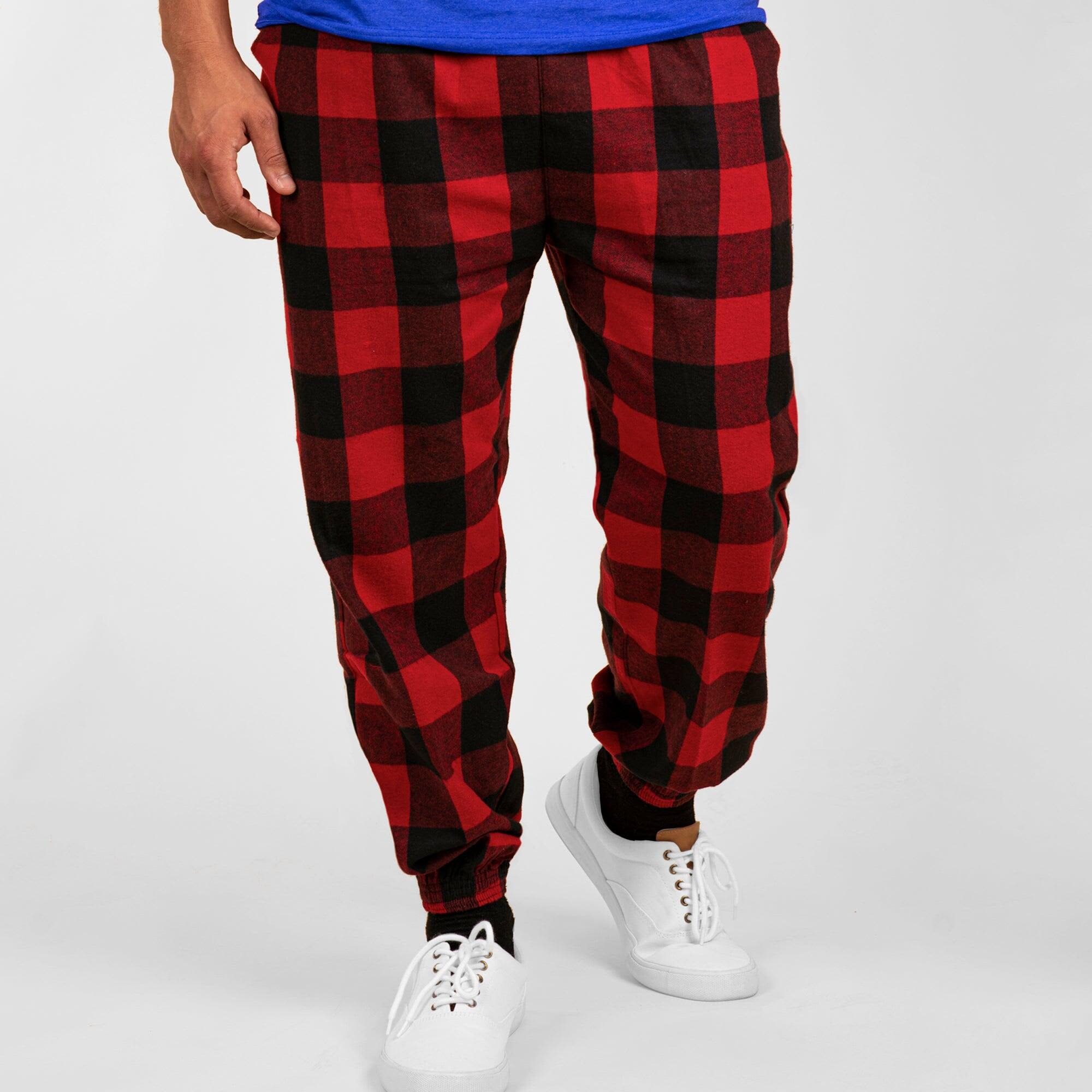 Comfy flannel jogger pants in red and black check pattern, featuring elastic cuffs and pockets. Logo visible on waistband. Comfy Flannel Jogger Pants - Image 1