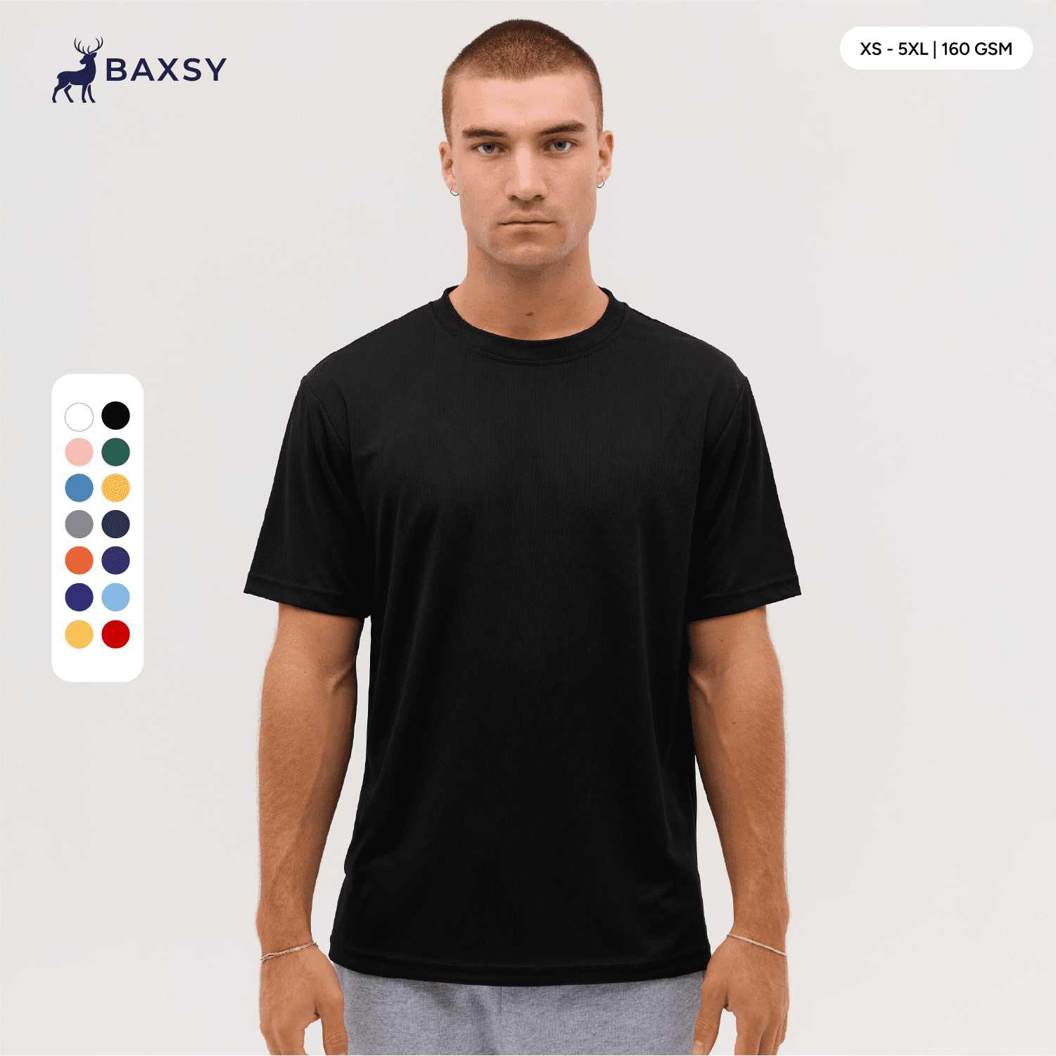 A man wearing a black t-shirt, featuring short sleeves and a relaxed fit, displayed with a colour palette alongside. Core Tee - Image 1