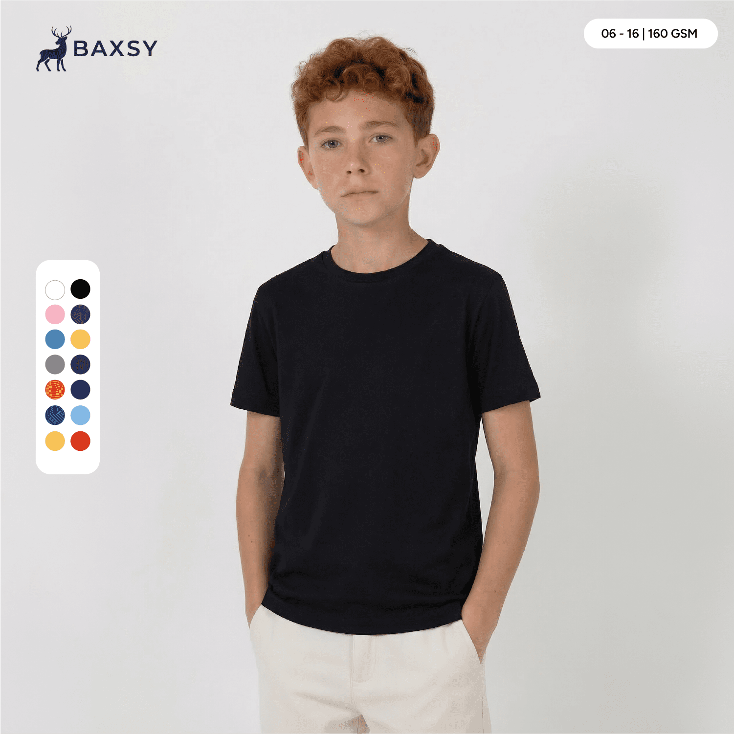 A youth black core tee displayed on a model, featuring a round neck and short sleeves, with a logo present. Youth Core Tee - Image 1