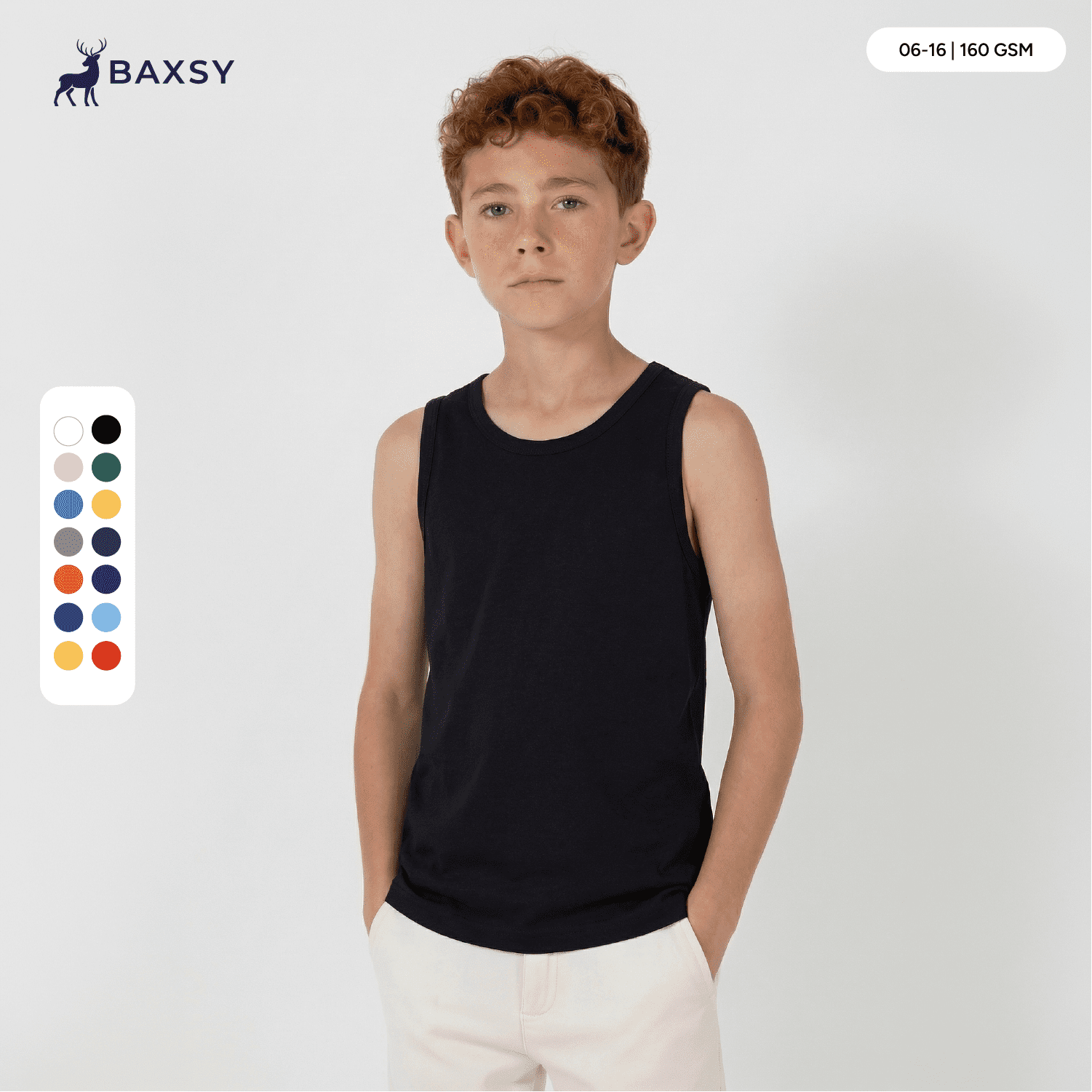 A youth singlet in black, featuring a round neckline and a logo, modelled by a young boy. Available in multiple colours. Youth Core Singlet - Image 1