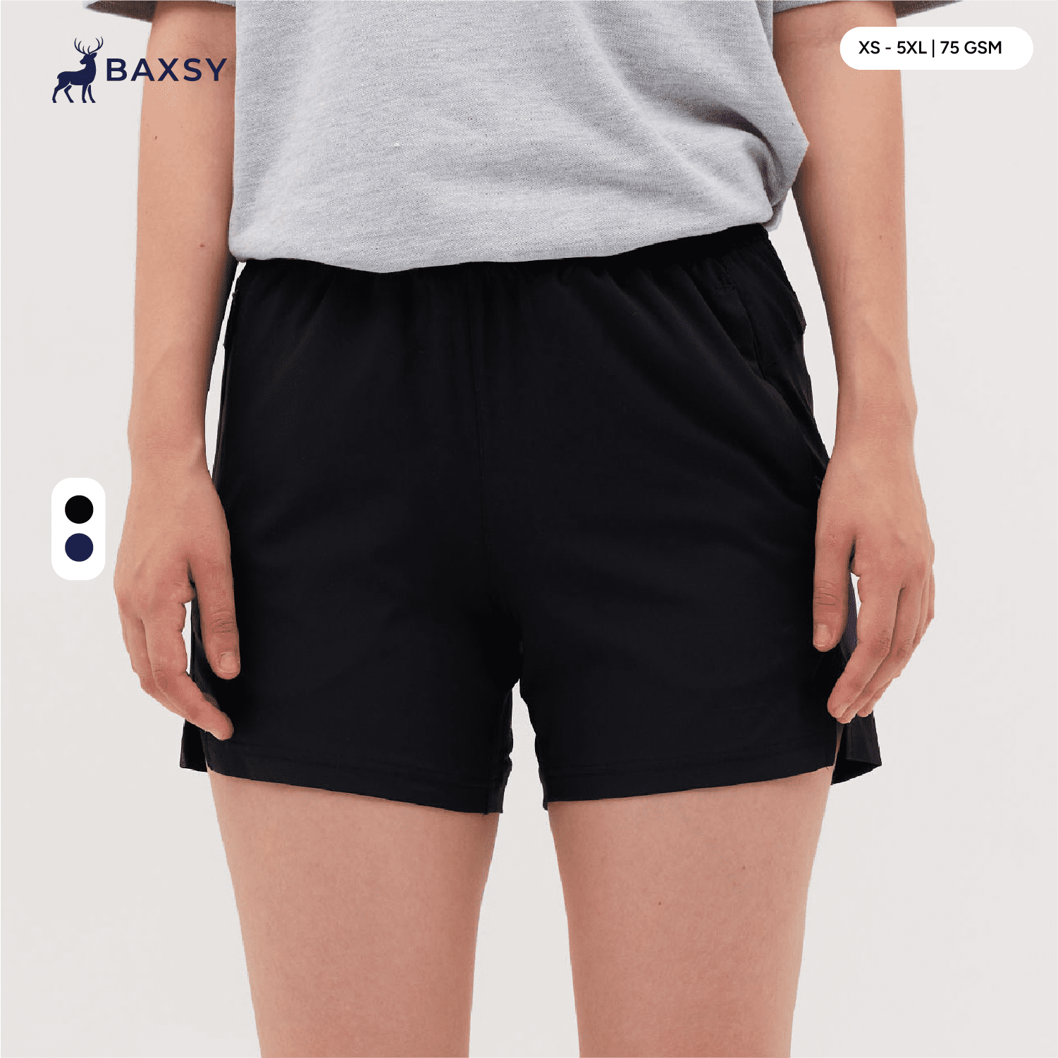Black running shorts with an elastic waistband, featuring pockets and a logo on the waistband. Running Shorts - Image 1