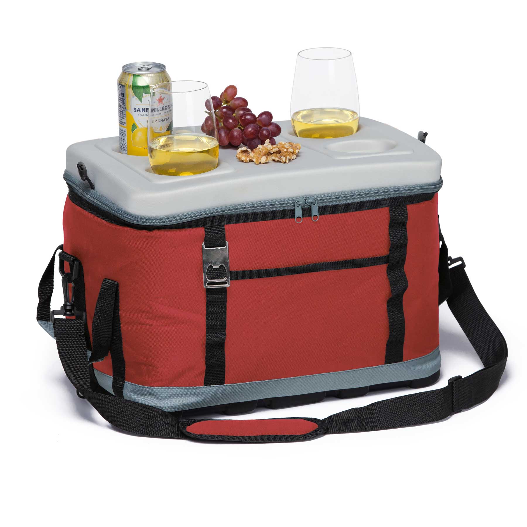 A red cooler with a grey lid, featuring drinks, glasses, grapes, and nuts on top, plus a carry strap. EVA Big Chill Cooler - Image 1