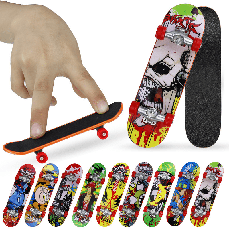 A mini finger skateboard in orange and red with various graphic designs, featured alongside multiple themed skateboards. Mini Finger Skateboard - Image 1