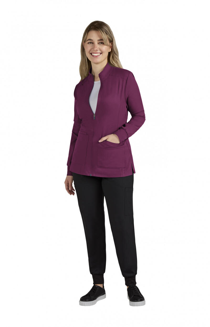A women's jacket in a rich purple colour, featuring a zip front and pockets, paired with black trousers. Geneses Womens Jacket - Image 1