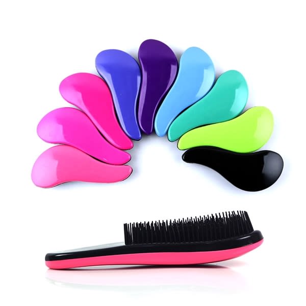 A hair comb with a handle in pink, black, and various other vibrant colours, displayed in a curved arrangement. Hair Comb with Handle - Image 1