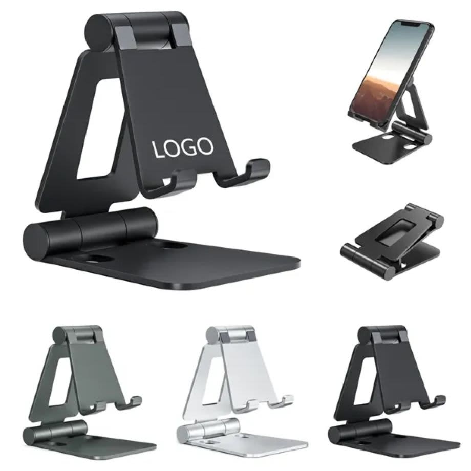 A black folding cell phone stand in various positions, featuring a logo, suitable for holding mobile devices. Folding Cell Phone Stand - Image 1