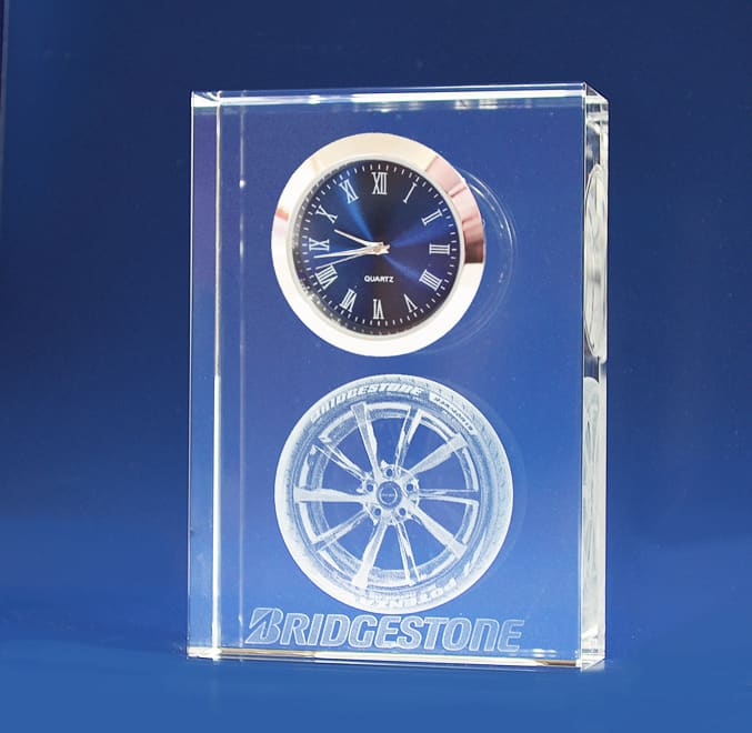 A clear 3D crystal rectangle featuring a clock at the top and a tyre design at the bottom, with a logo. 3D Crystal Rectangle crystal with Clock - Image 1