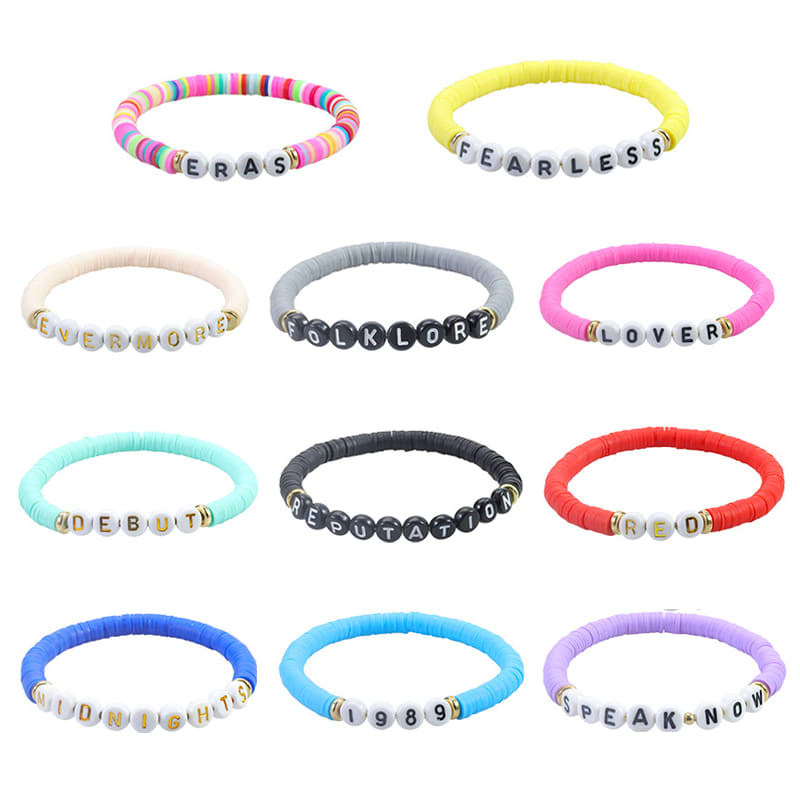 A collection of colourful friendship beaded bracelets featuring various lettered beads and vibrant rubber bands. Friendship Beaded Bracelet - Image 1