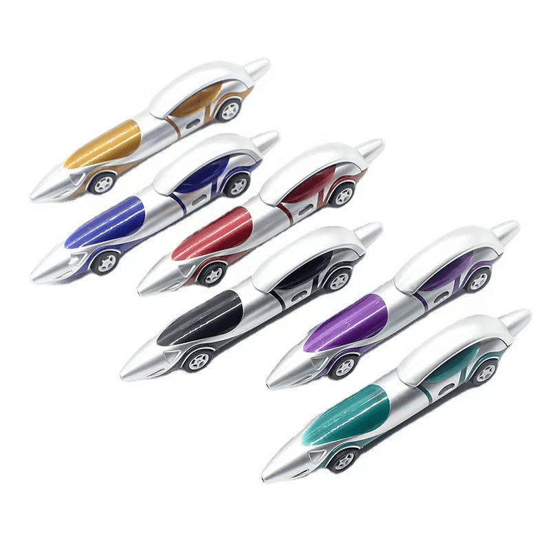 A set of race car-shaped ballpoint pens in various colours: gold, blue, red, black, purple, and green, with silver accents. Race Car Ballpoint Pen - Image 1