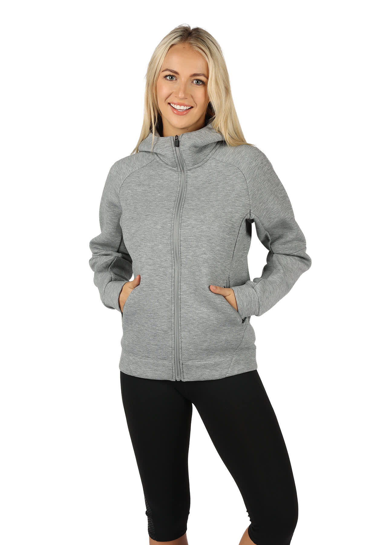A grey women's junior hoodie featuring a zip-up front and side pockets, modelled by a smiling woman. Womens'/Junior Meta Hoodie - Image 1
