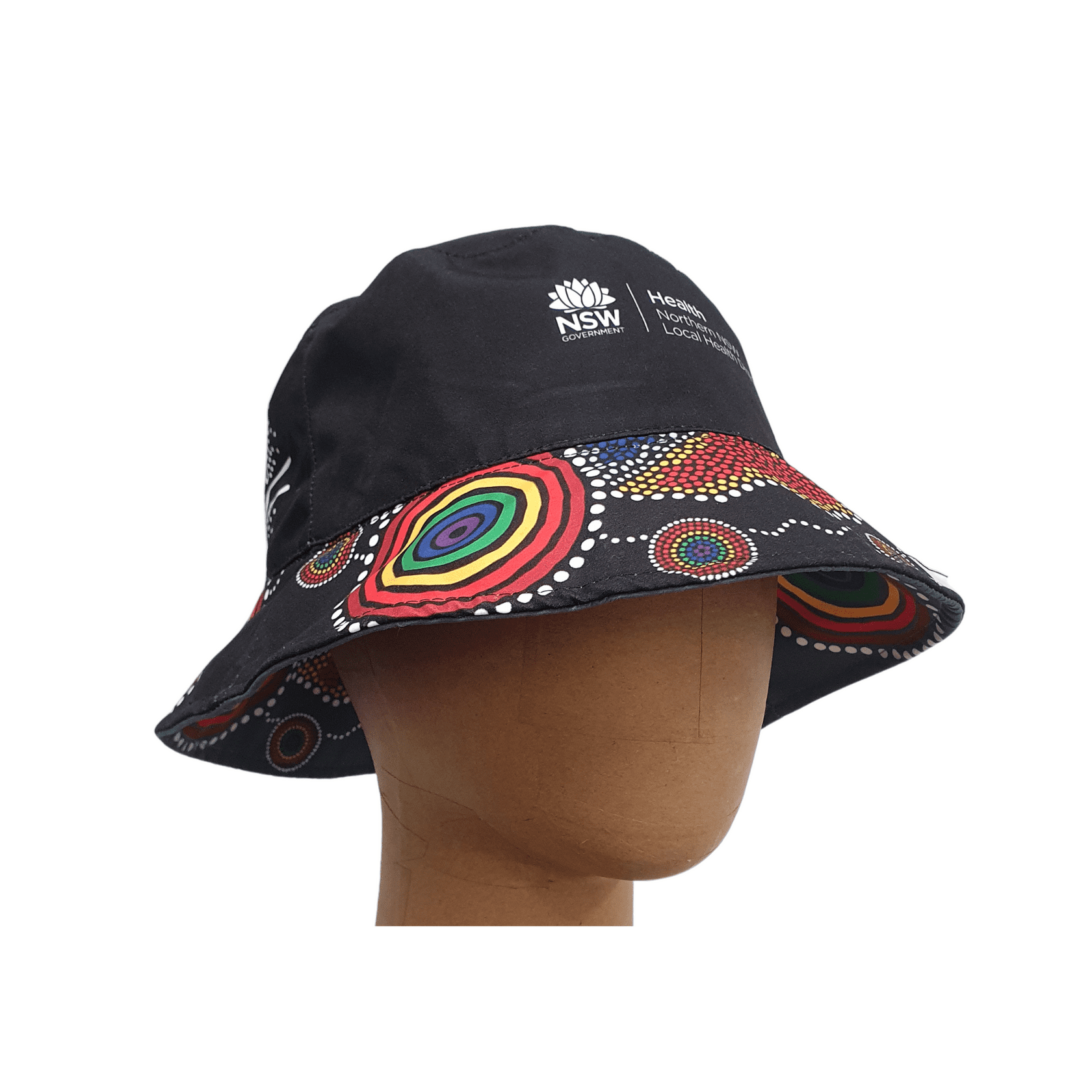 A black reversible bucket hat featuring a colourful Indigenous-inspired pattern, with a logo on the front. Geeza Sublimated rPET Reversible Bucket Hat - Image 1