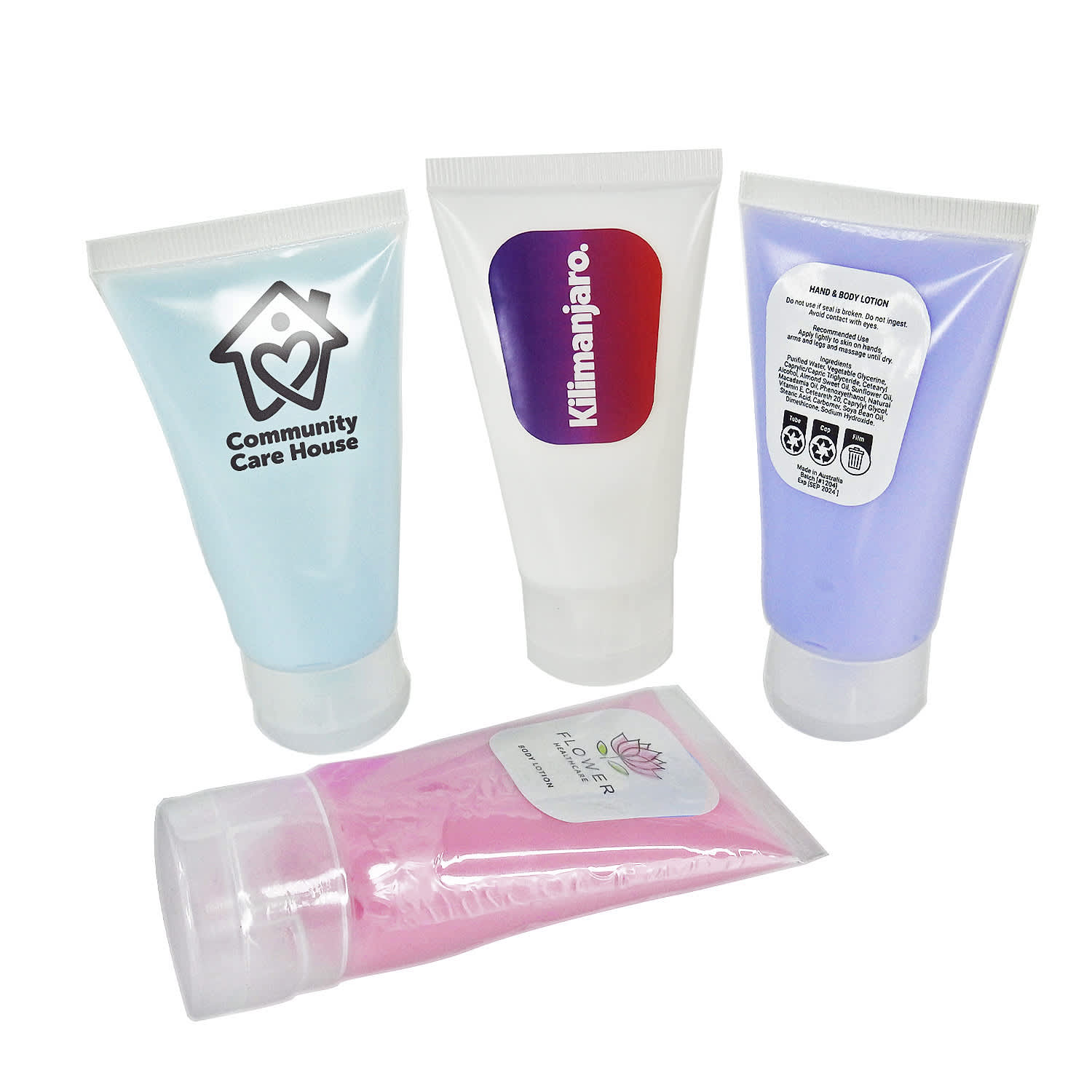 A set of four lotion tubes in light blue, purple, and pink, each with different branding and designs. Lotion Tube 60ml - Image 1