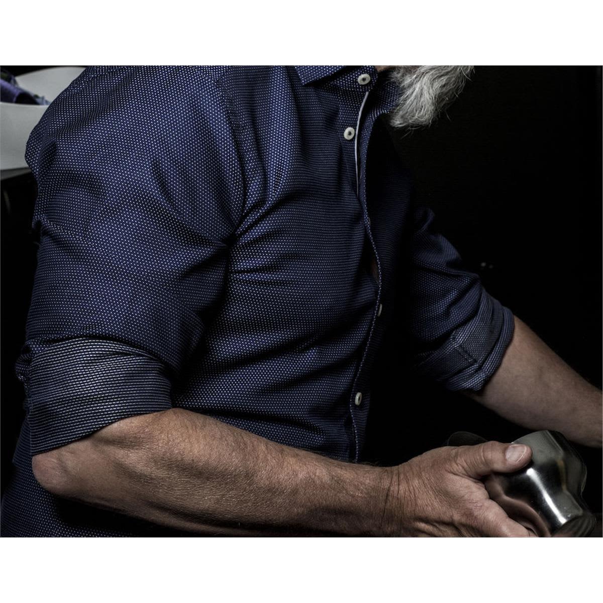 A dark purple button-up shirt featuring a textured pattern and rolled-up sleeves. The shirt has a branding logo. Purple Bow 49 Men's Shirt - Image 1