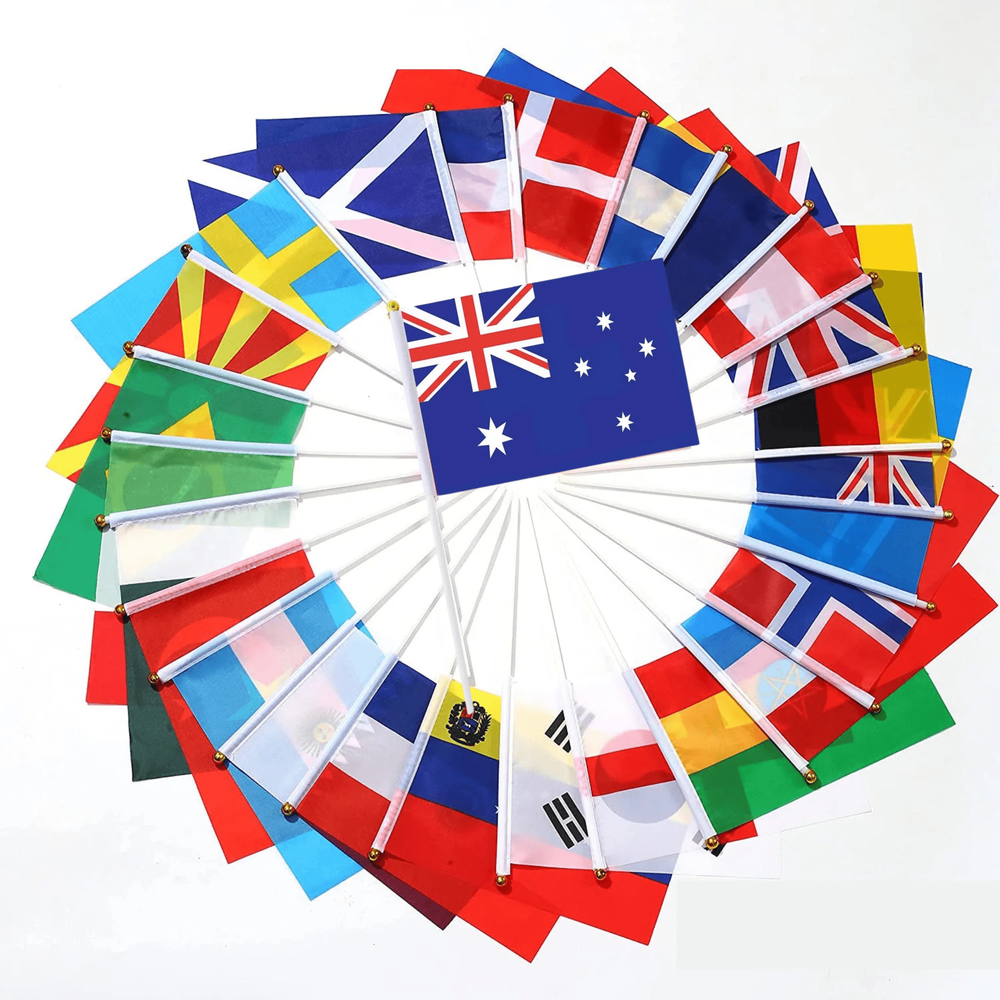 A collection of handheld flags, including the Australian flag, with various international flags on white poles. NAVARRE Polyester Handheld Flag with Pole - Image 1