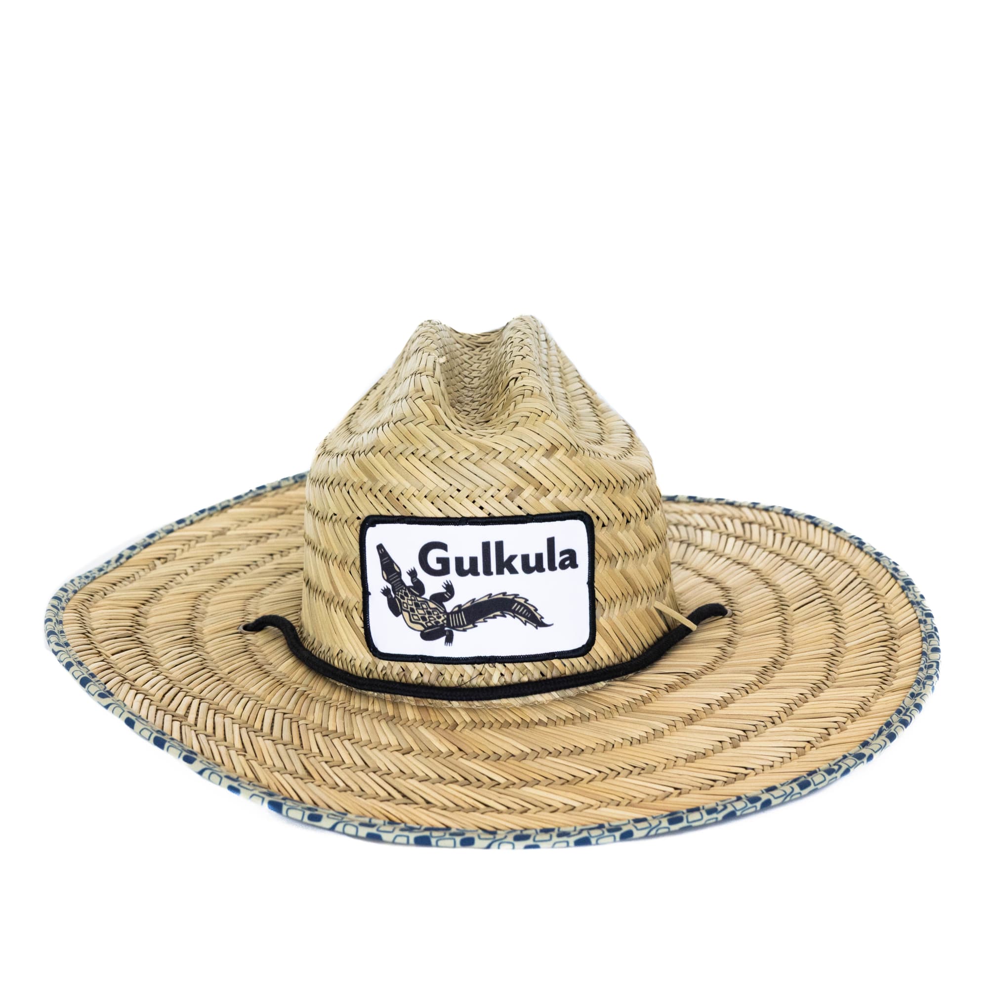 A straw hat with a wide brim, featuring a logo and decorative band around the base, in natural straw colour. Licem Straw Hat - Image 1
