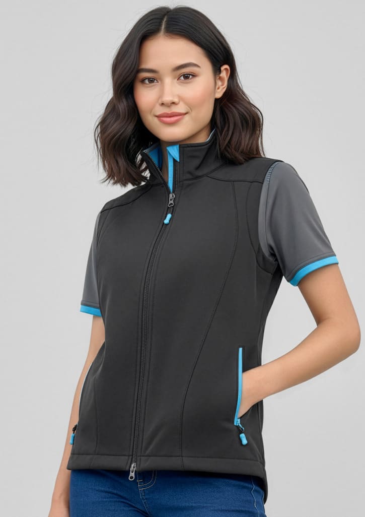 A black women's vest with blue accents, featuring a zip front and side pockets, worn with a short-sleeved top. Womens Geneva Vest - Image 1