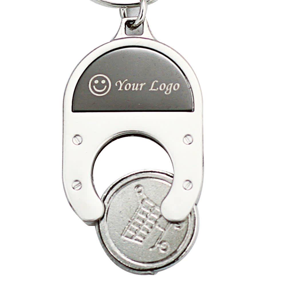 A coin holder keychain with a metallic finish and a logo area. It features a shopping trolley coin. Charlies keyring - Image 1