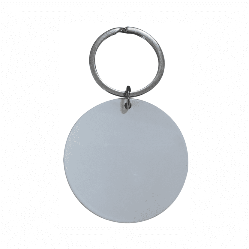A keyring featuring a large, circular blank tag in silver metal. Fraser keyring - Image 1