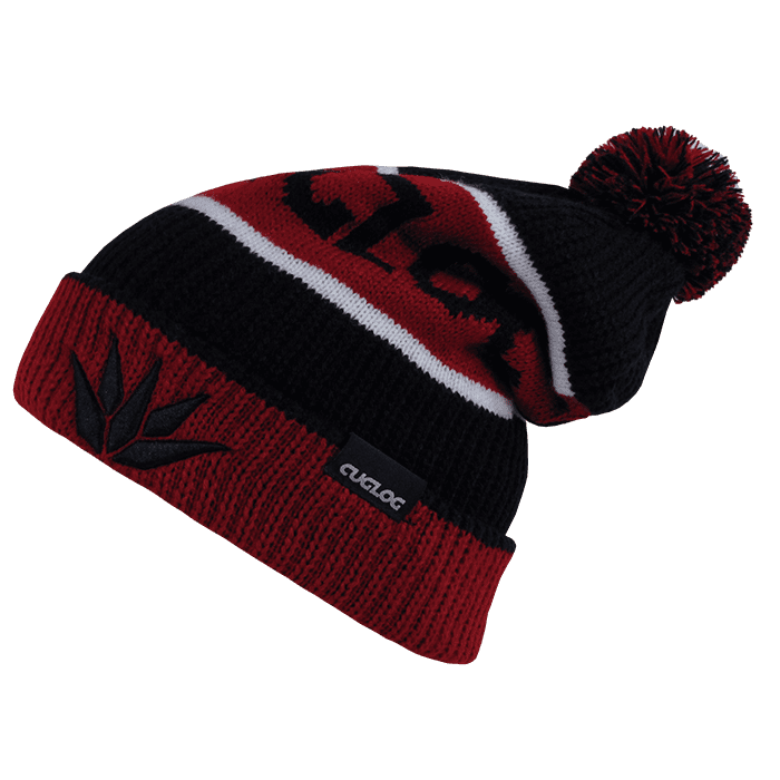 A beanie in black and red with a pom-pom on top and a logo patch. Cotopaxi Beanies - Image 1