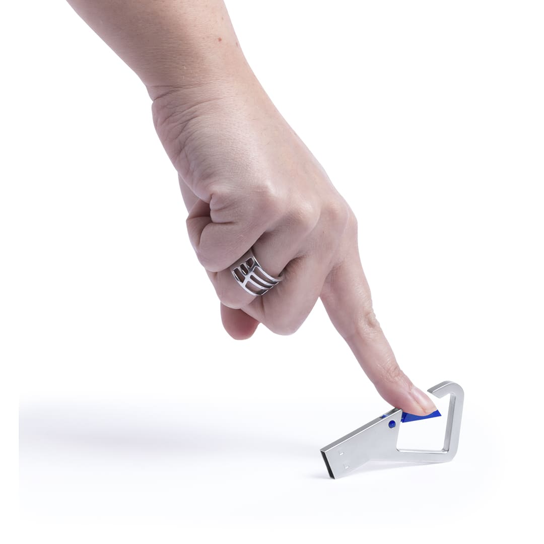 A USB memory drive in silver and blue, being pressed by a hand with a silver ring. USB Memory Drelan 8GB - Image 1