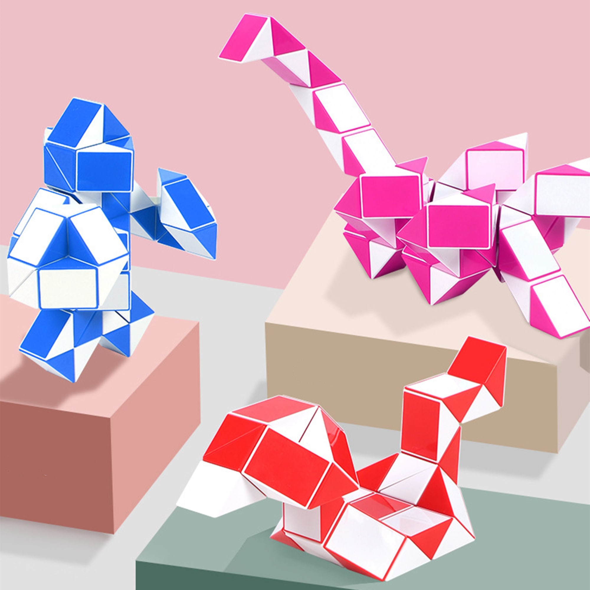 Three colourful 24 Segments Magic Rulers in blue, pink, and red, forming various shapes on pastel backgrounds. 24 Segments Magic Ruler - Image 1