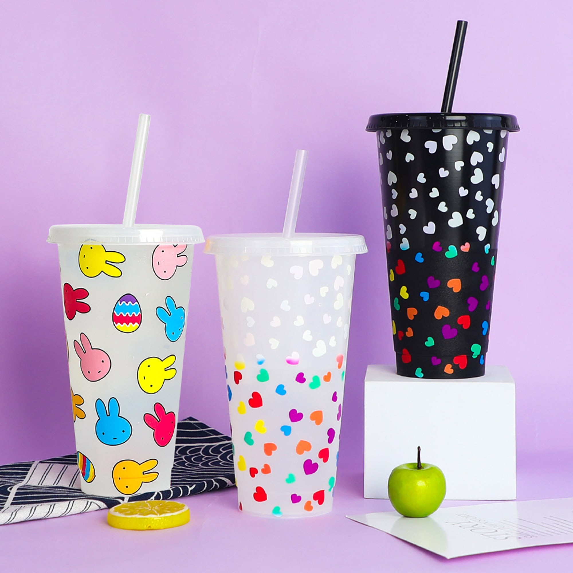A drink bottle set featuring three 24oz colour changing cups with straw, decorated in playful bunny and heart patterns. 24oz Color Changing Cup with Straw - Image 1