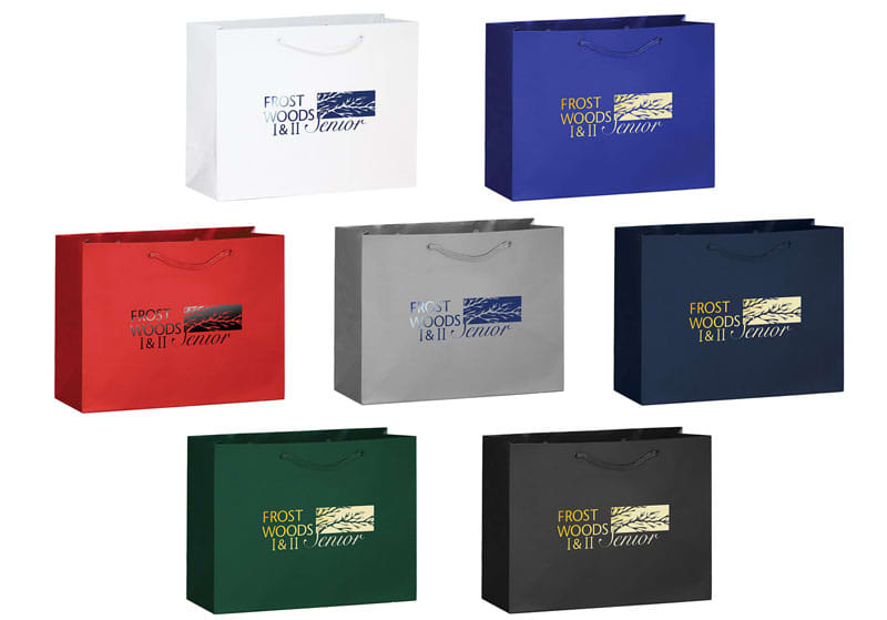 A collection of landscape tote bags in white, blue, red, green, black, and other colours with handles and logos. Full Colour Print Landscape Bag - Image 1