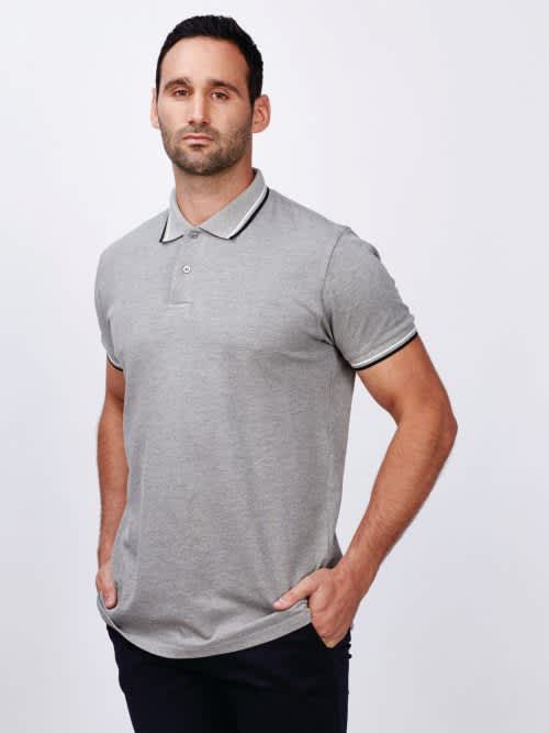 A men's grey polo shirt with contrasting trim and a logo on the chest, styled on a male model. Bobby - Mens Polo - Image 1