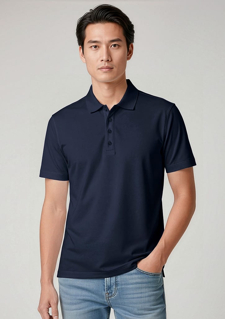 A navy short sleeve polo shirt featuring a collar and a branded logo. Model wears it with light blue jeans. Mens Action Short Sleeve Polo - Image 1
