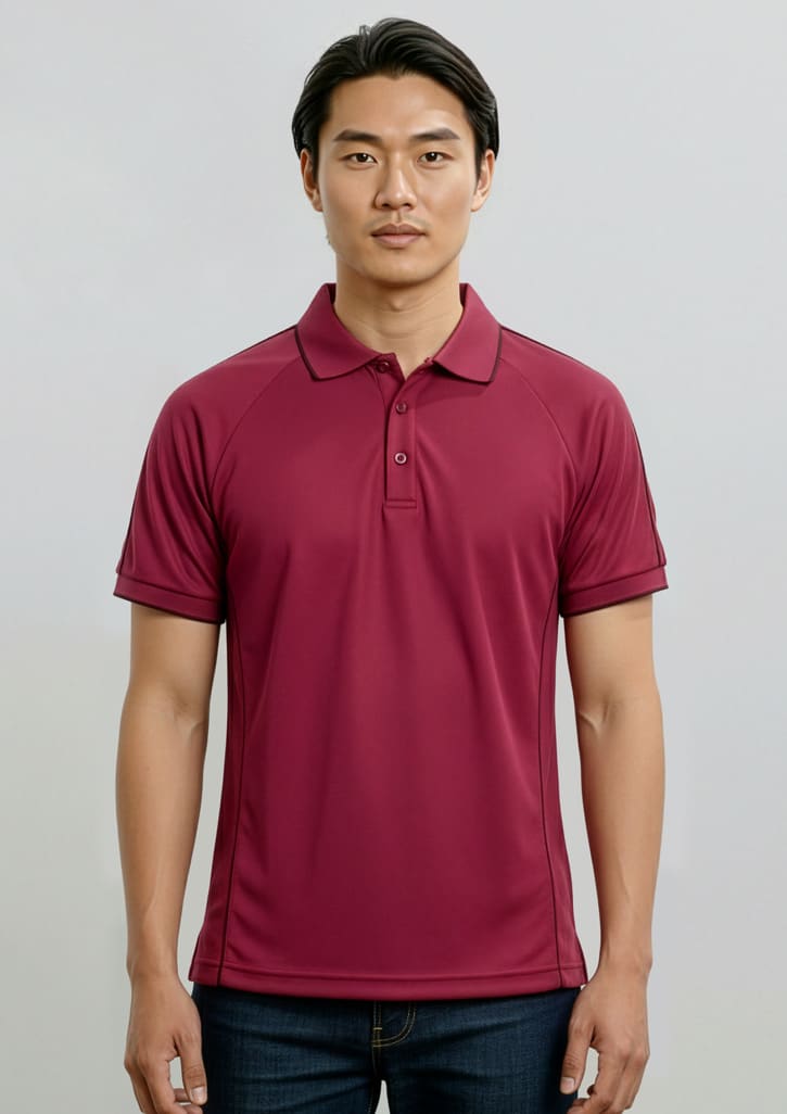A maroon men's short sleeve polo shirt with a collar and logo, displayed on a model against a neutral background. Mens Resort Short Sleeve Polo - Image 1