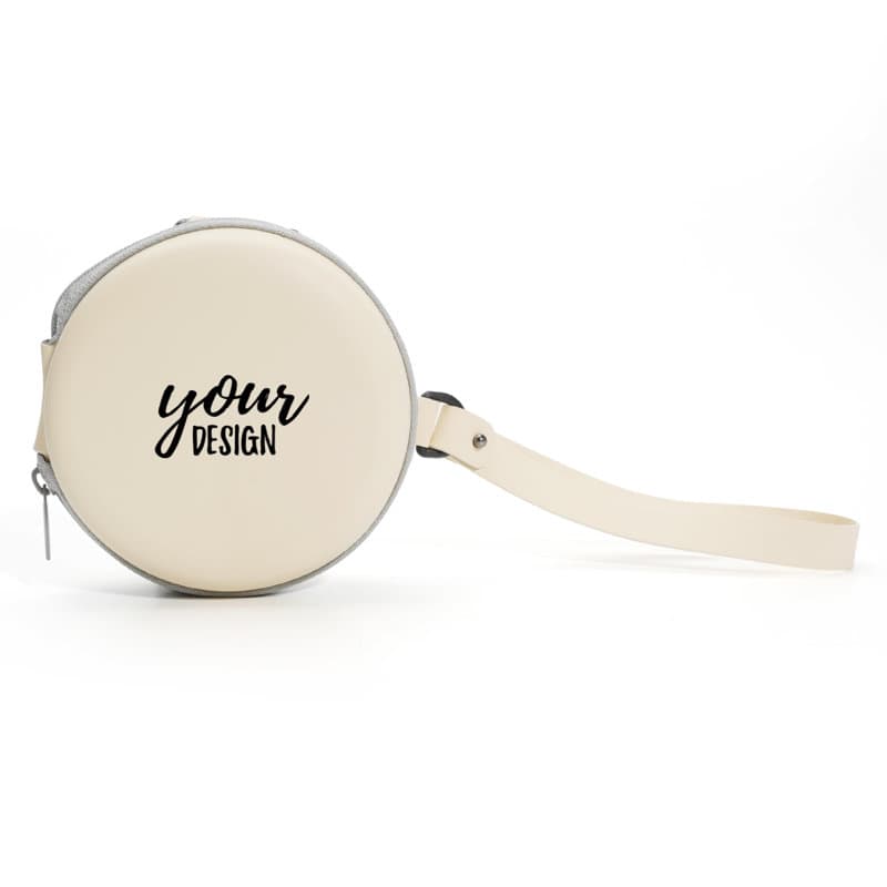 A round, cream folding eyeglasses case with a zipper and a strap, featuring a customisable design area. Folding Eyeglasses Case With Zipper - Image 1