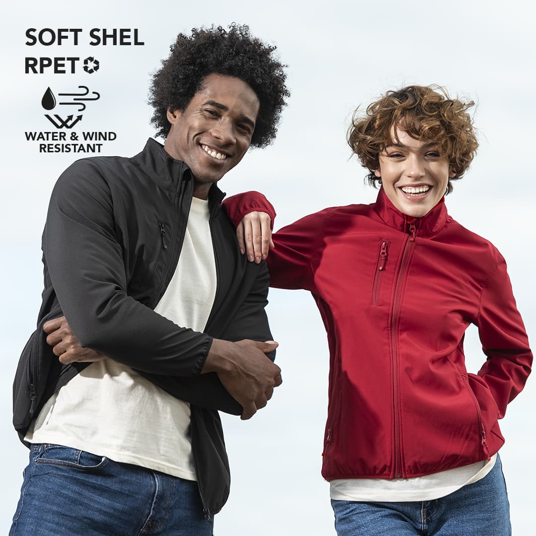 A black and a red jacket displayed by two smiling people, showcasing a soft shell design with a logo. Scola - Image 1