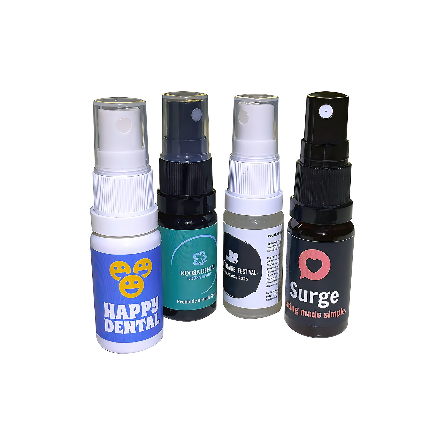 Four spray bottles in various colours, featuring logos, containing probiotic breath fresheners. Probiotic Breath Freshener - Image 1