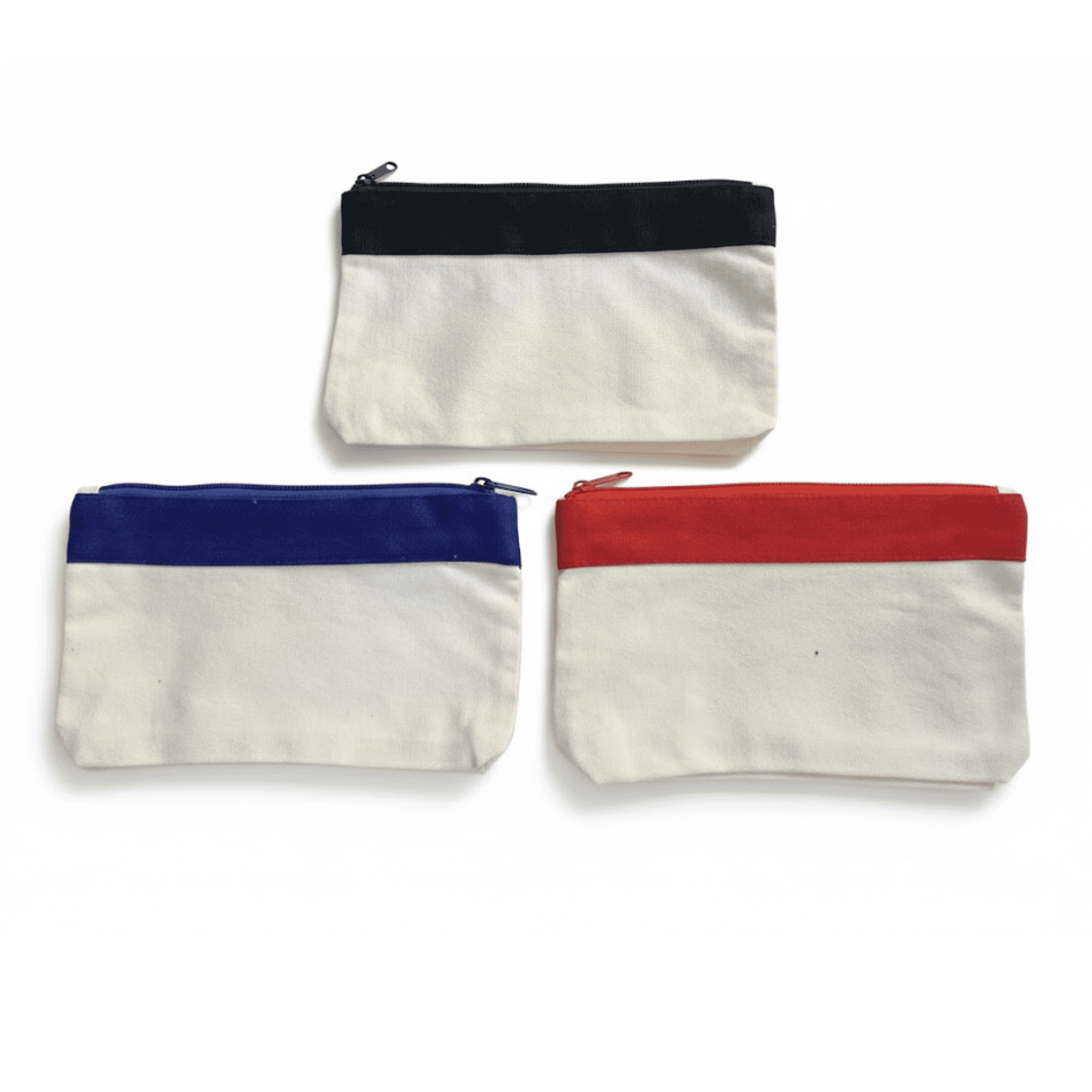 A trio of canvas pencil cases in navy, royal blue, and red, featuring a cream-coloured body. Each has a zip closure. Canvas Pencil Case - Image 1
