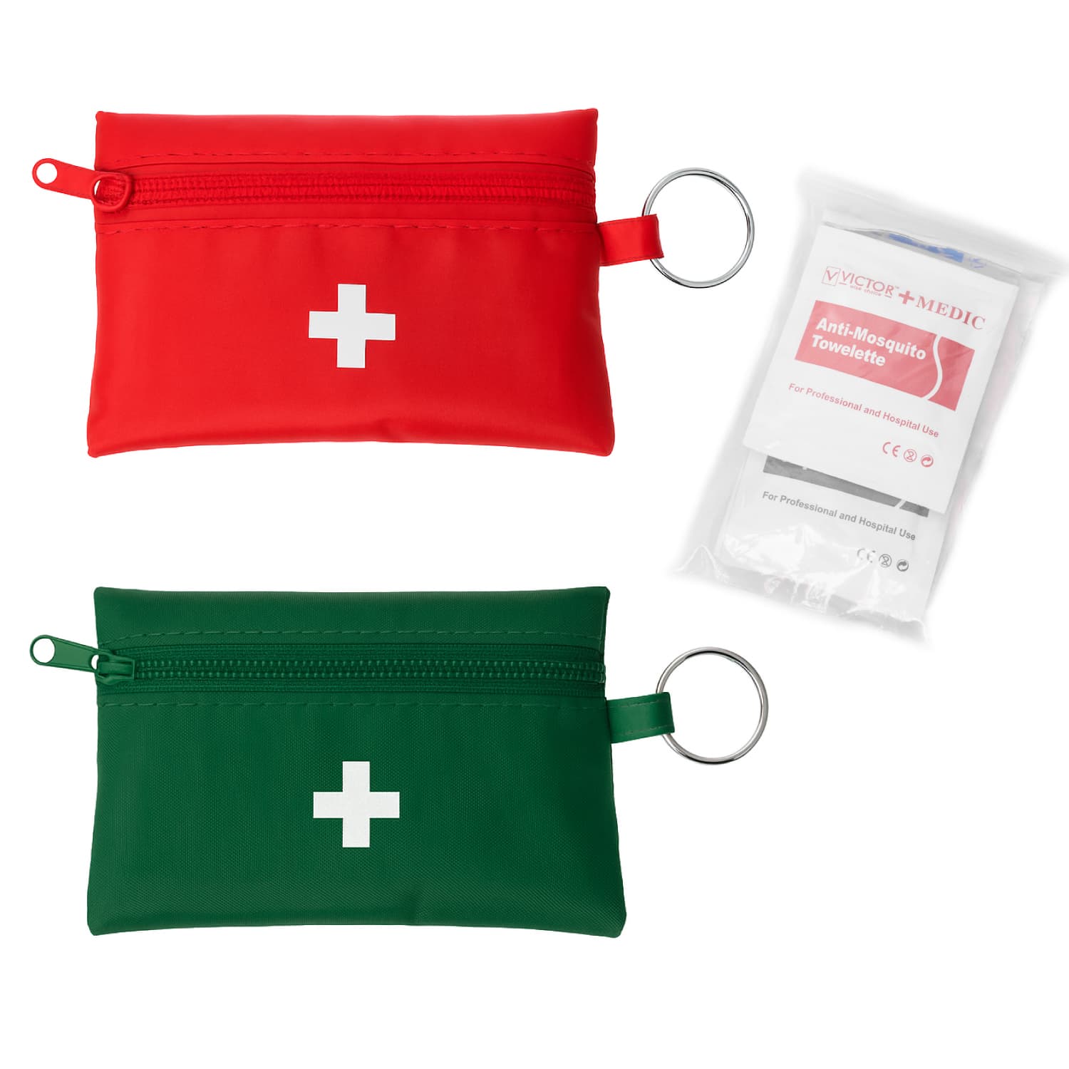 Two small first aid kits in red and green, each with a white cross, accompanied by a package of anti-mosquito towelettes. First Aid Travel Kit - Image 1
