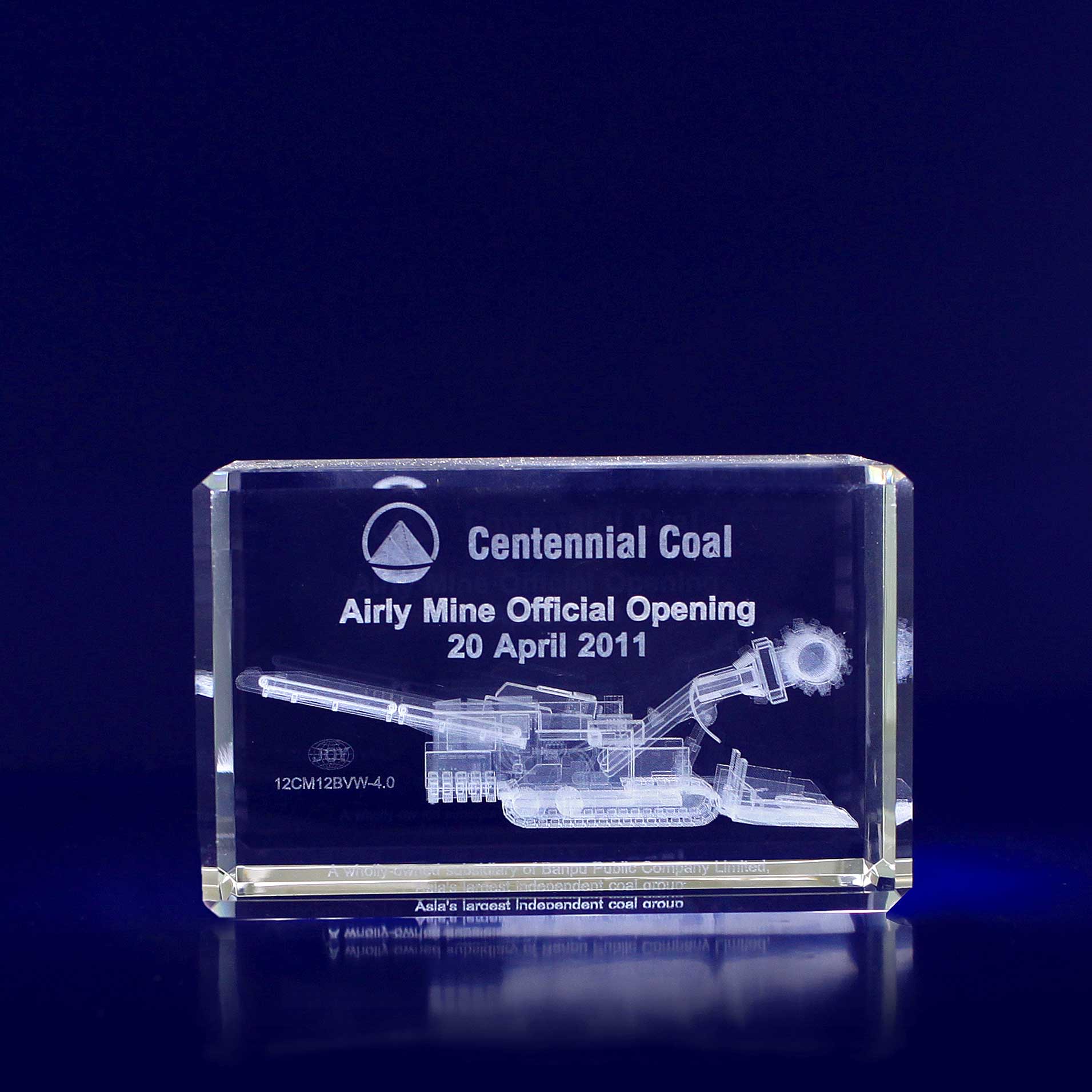 A rectangular clear crystal trophy featuring an engraved image of mining machinery and a logo. 3D Crystal Tower - Image 1