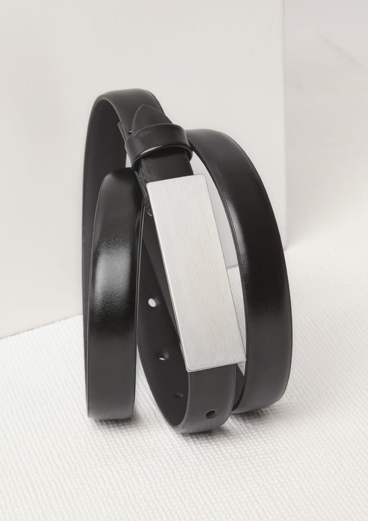 A black leather belt with a silver-tone metal embellishment, featuring a sleek and minimalist design. Womens Leather Belt - Image 1
