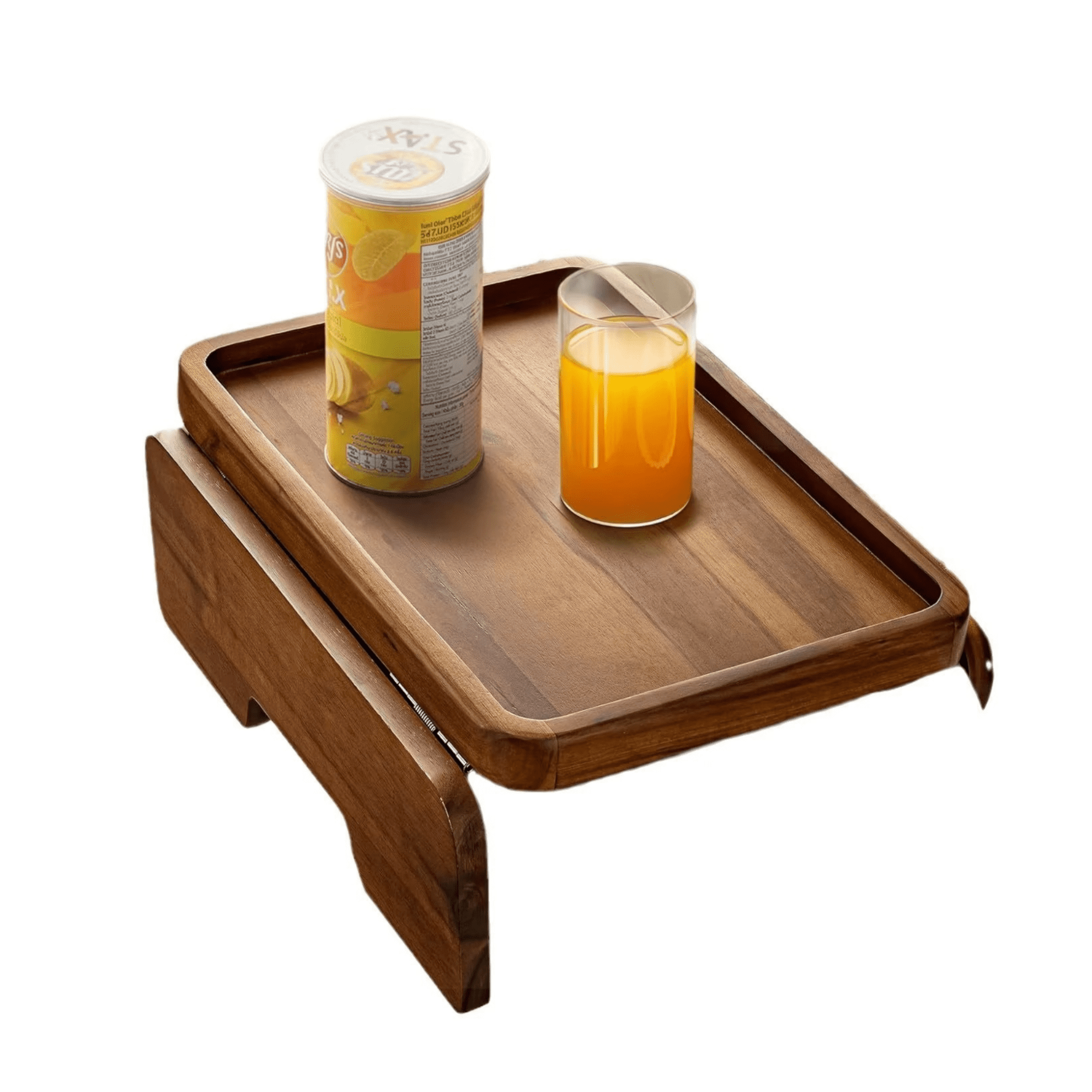 A wooden lounge caddy with an orange drink in a glass and a can of soda on the tray. “The Homer” Lounge Caddy - Image 1