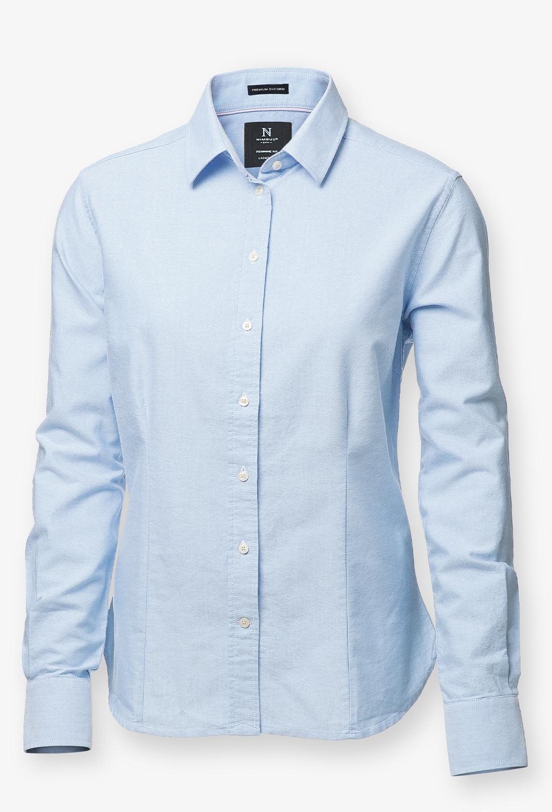 A light blue button-up shirt with long sleeves and a collar, featuring a branded tag. Rochester Women Shirt - Image 1