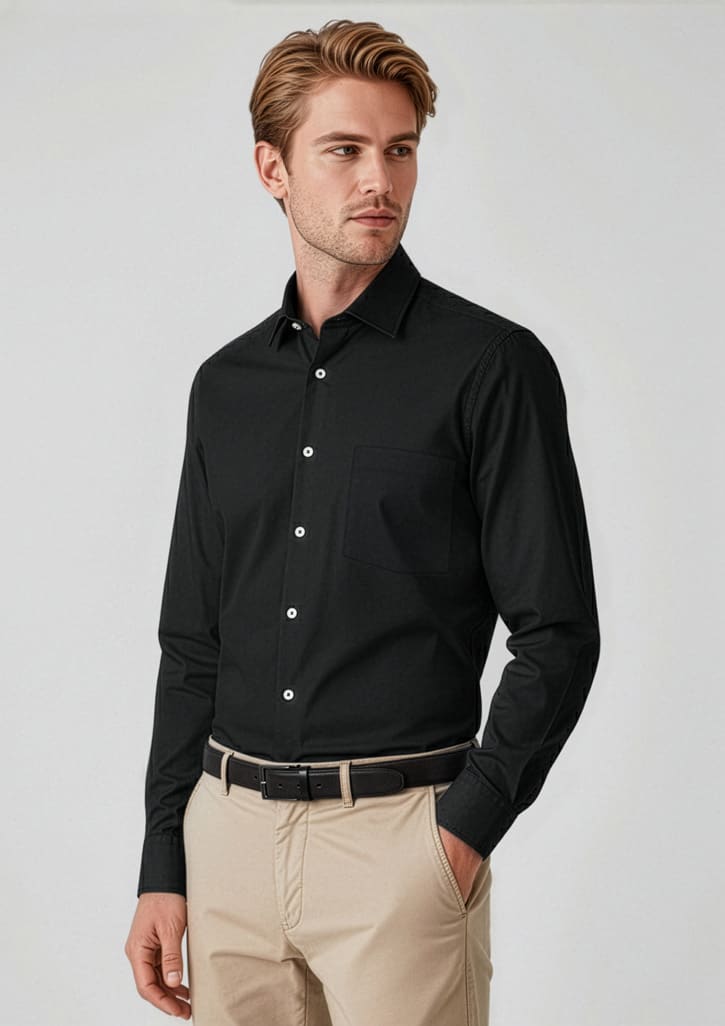 A black long sleeve button-up shirt worn by a model, featuring a sleek design and a collar, paired with beige trousers. Mens Charlie Classic Fit Long Sleeve Shirt - Image 1