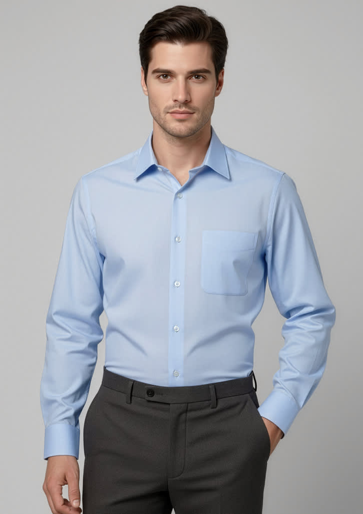 A blue long sleeve button-up shirt with a chest pocket, featuring a logo on the fabric. Mens Luxe Long Sleeve Shirt - Image 1