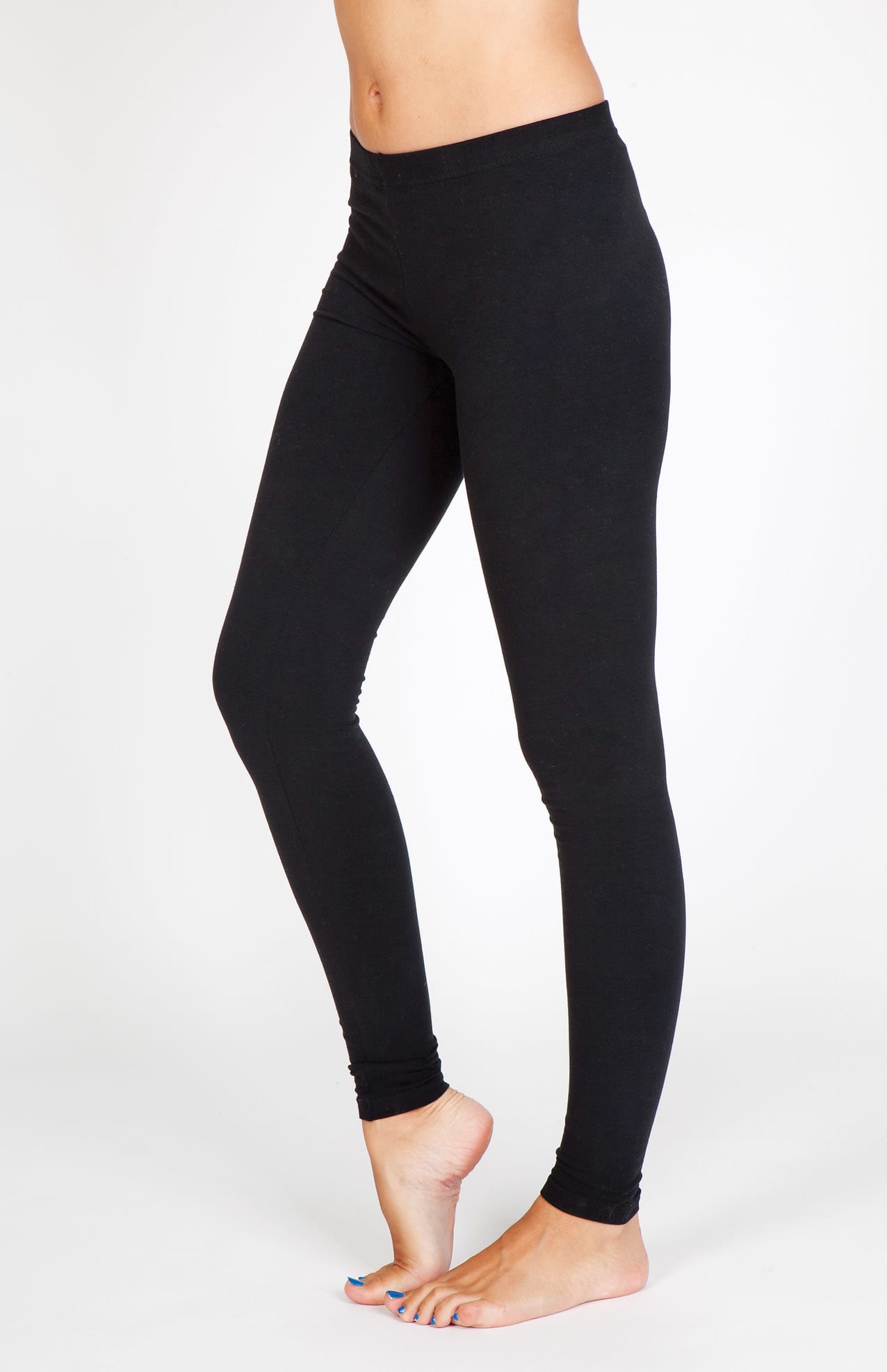 A pair of women's full-length leggings in black, made from cotton and spandex, displayed on a model. Womens Cotton Spandex Full Length Legging - Image 1