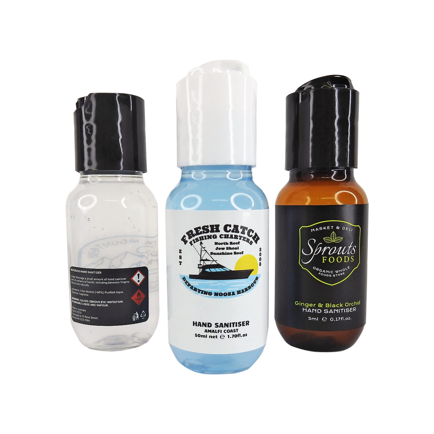 Three hand sanitiser bottles in various shapes and sizes: clear, blue, and dark brown, each with a black cap. Hand Sanitiser Bottle - Image 1