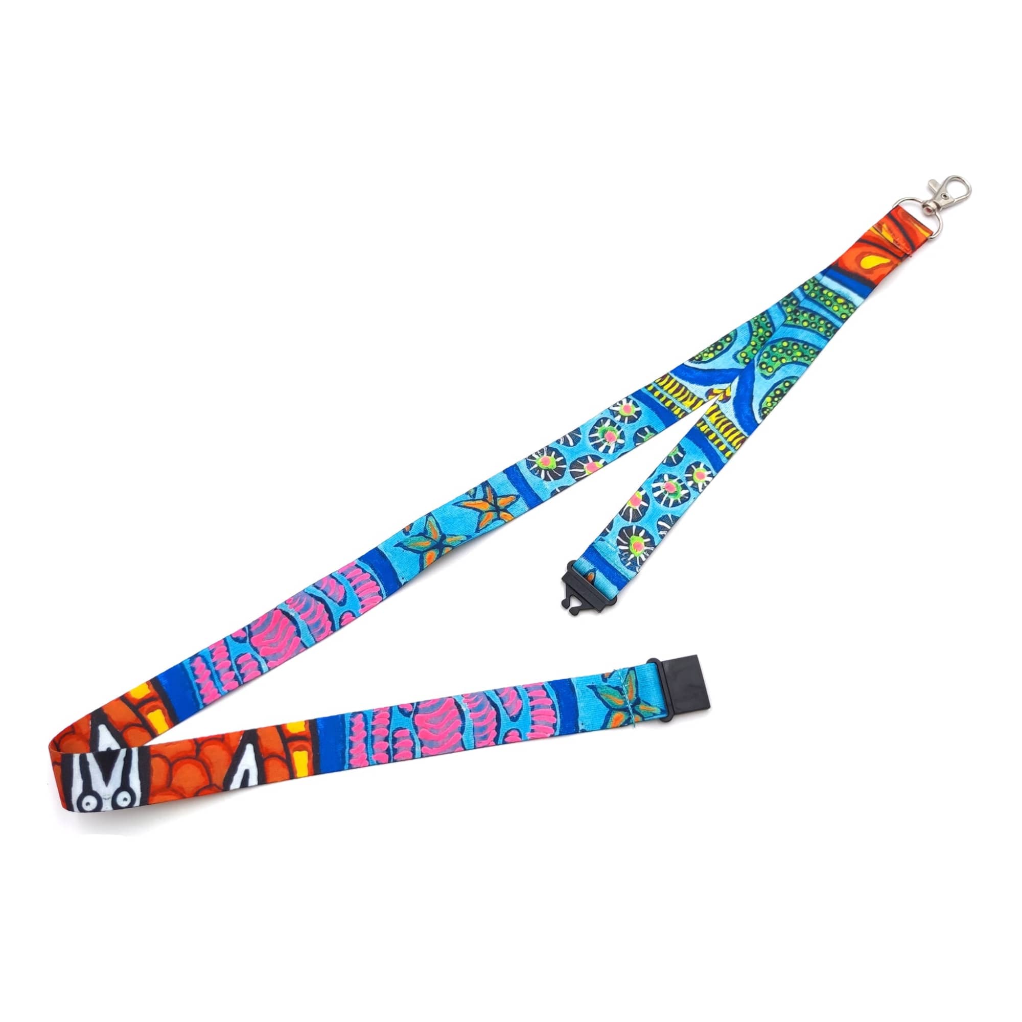 A vibrant, multi-coloured lanyard with a side clip and a design featuring various patterns and shapes. Side-Clip RPET Lanyard - Image 1