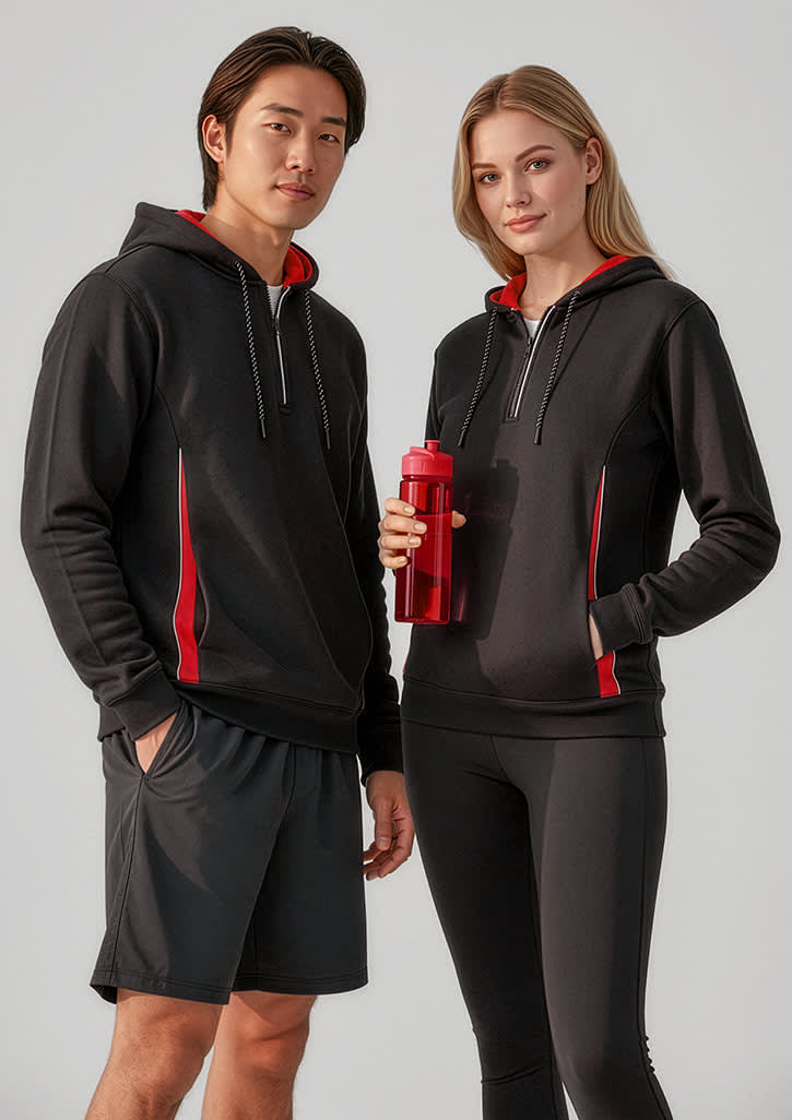 A unisex black hoodie with red accents, featuring a logo, worn by a male and female model. Unisex Renegade Hoodie - Image 1