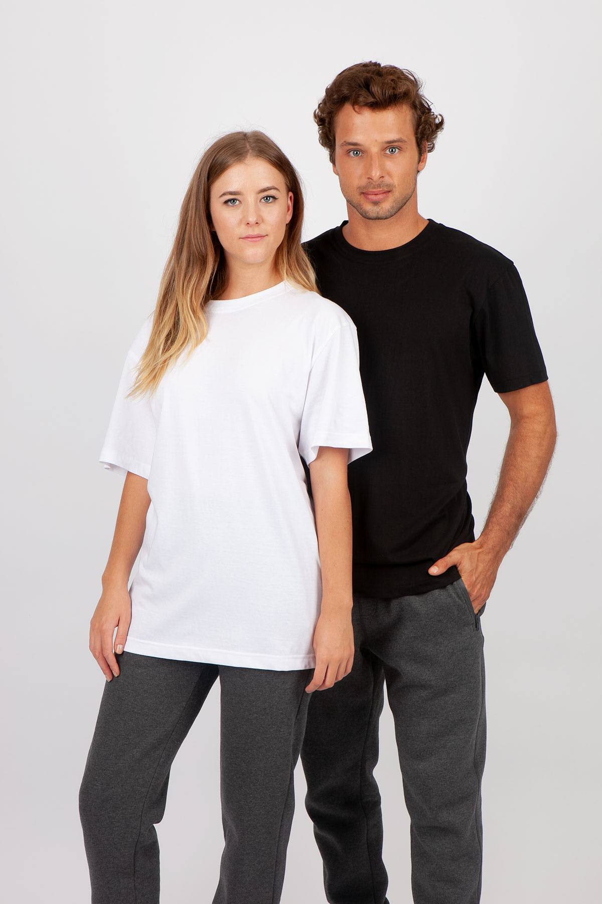 A black and a white unisex t-shirt displayed on models, featuring a casual fit and short sleeves. Men's / Unisex Hype Unisex T-shirt - Image 1