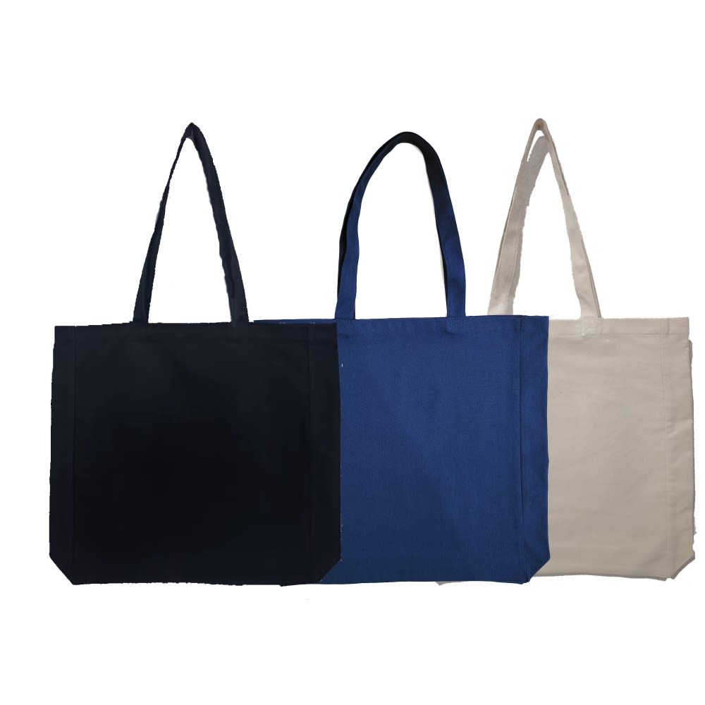 Three reusable tote bags in navy blue, royal blue, and beige, featuring sturdy handles and a spacious design. Boston cotton canvas bag - Image 1