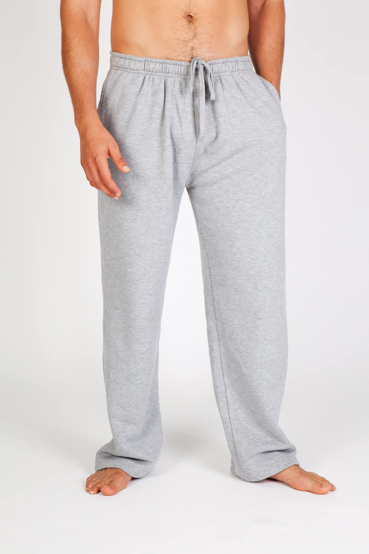 Men's fleece track pants in grey, featuring an elastic waistband and a relaxed fit. Ideal for casual wear. Mens Fleece Track Pants - Image 1