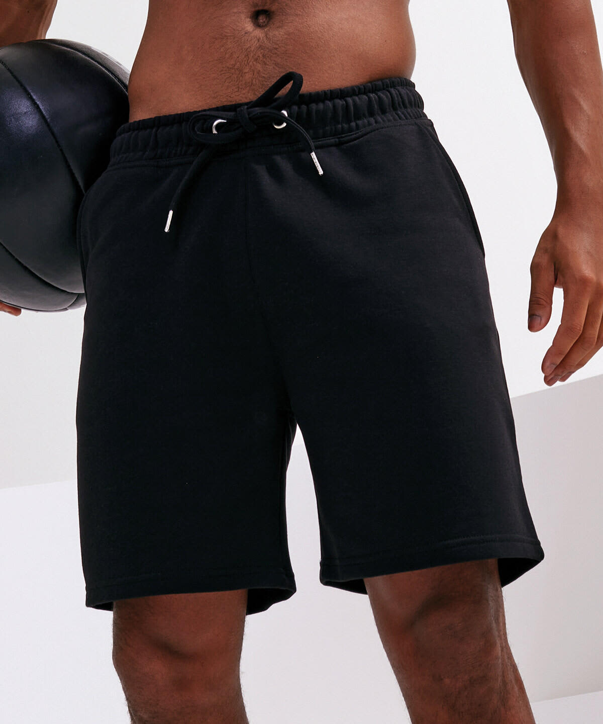 Black jogger shorts with an elasticated waistband, featuring a drawstring and side pockets. A logo is visible. Jogger Shorts - Image 1