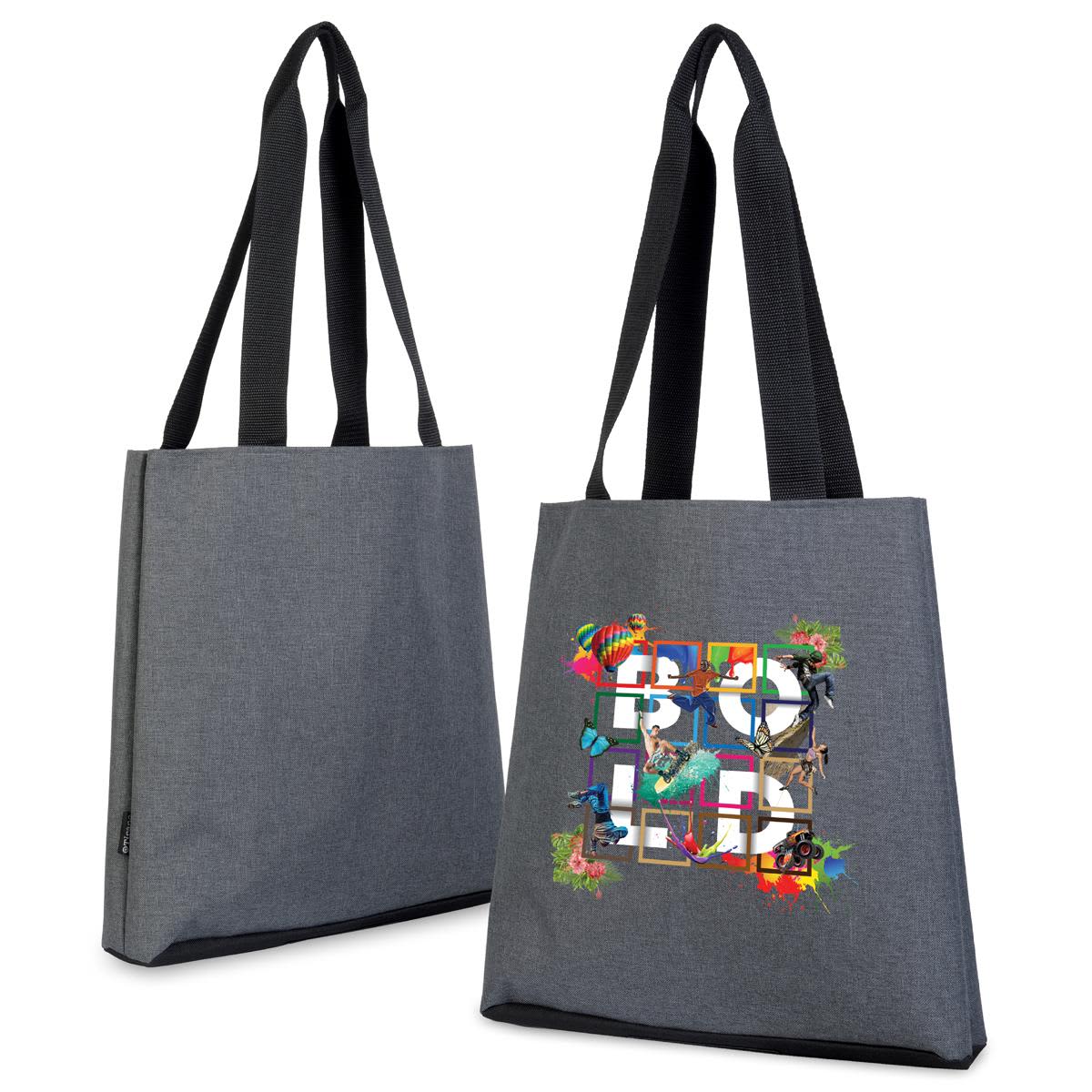 A grey tote bag featuring a vibrant design on one side and black straps. The bag has a logo. Tirano Tote Bag - Image 1